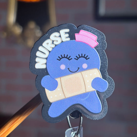 Glove Nurse holding band-aid - Acrylic Badge Reel