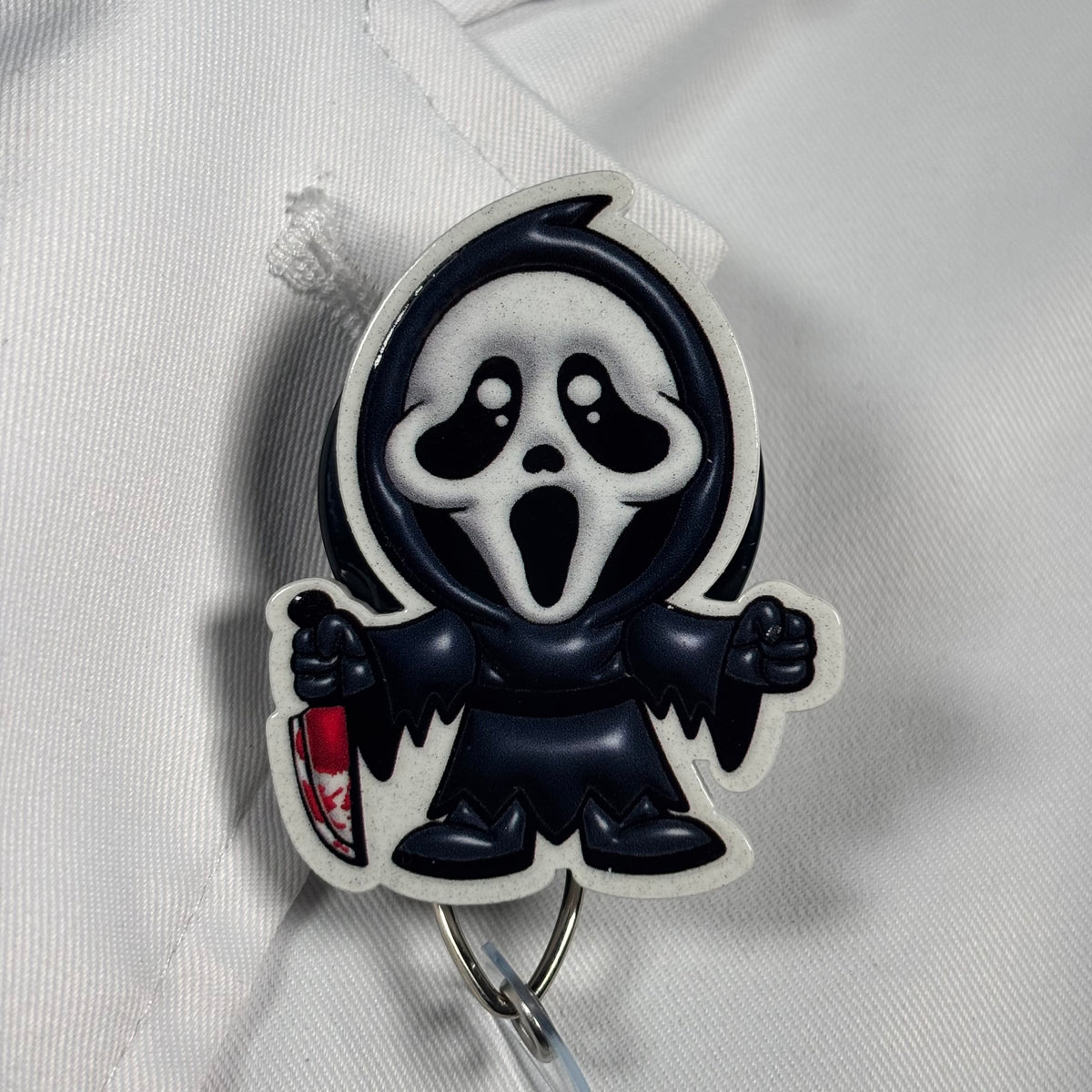 Puffy Scream Badge Reel